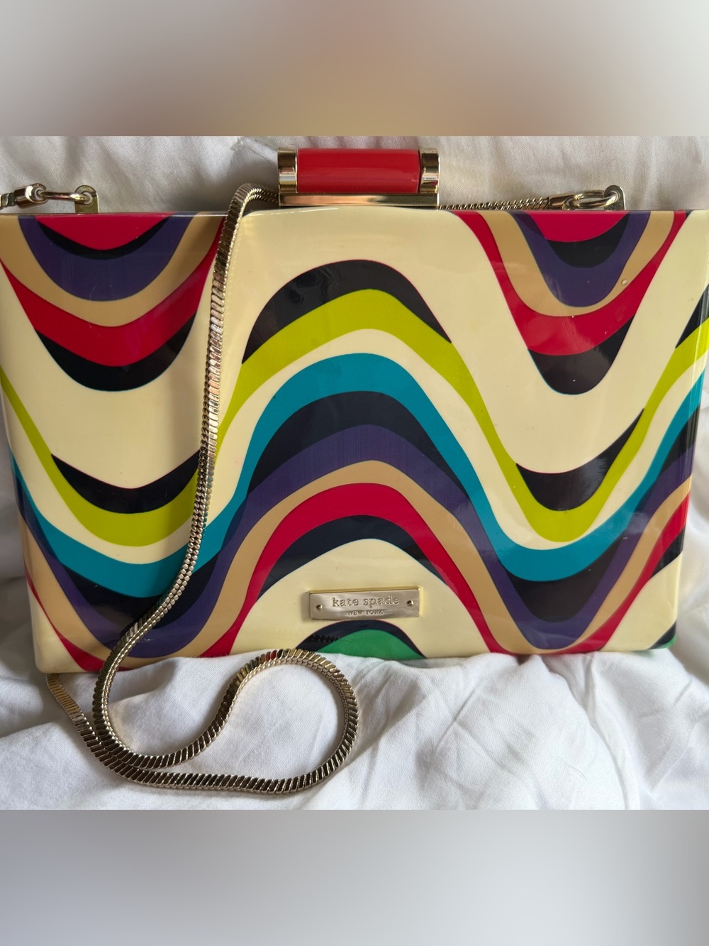 Kate Spade "Miss Penny's Emanuelle" Frame Clutch in the Brighton Wave print